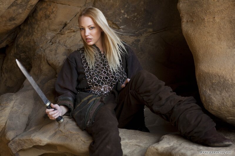 woman in chainmail with sword