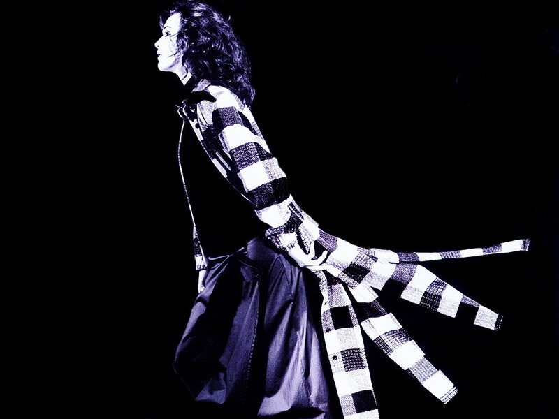 Woman in Checkered Coat