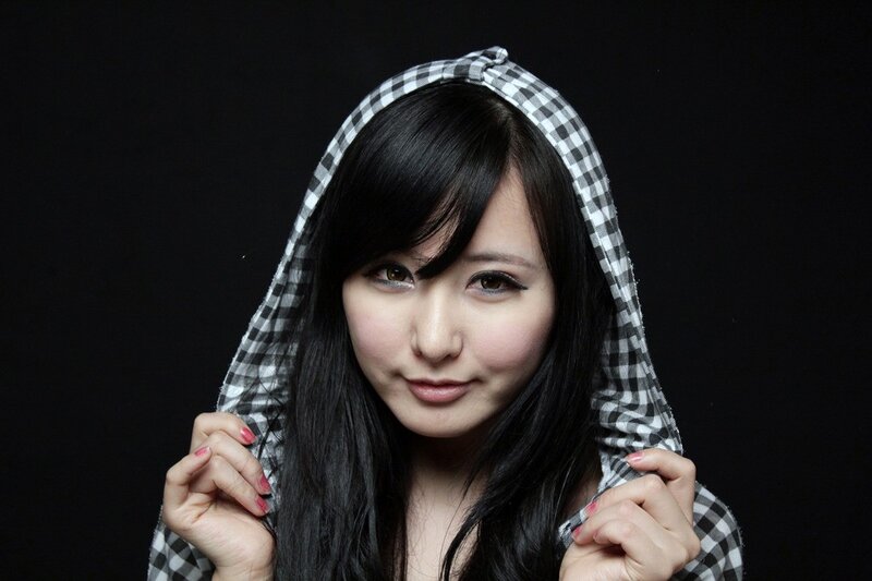 woman in checkered hood