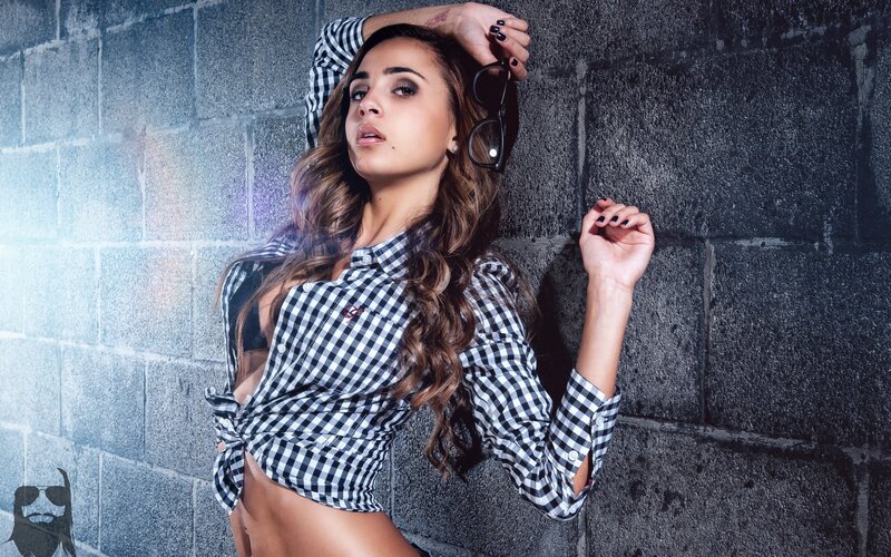 woman in checkered shirt