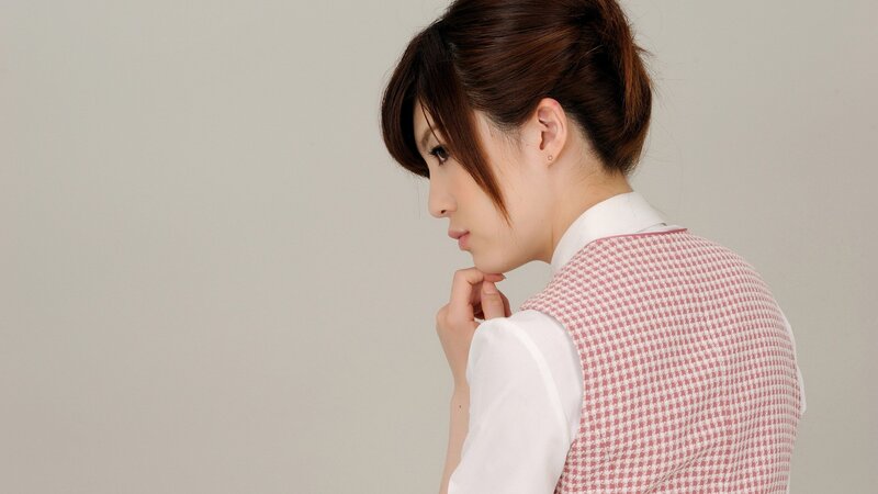 woman in checkered vest