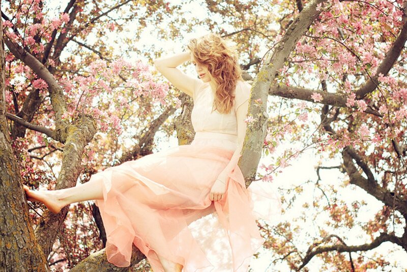 Woman in Cherry Blossom Tree