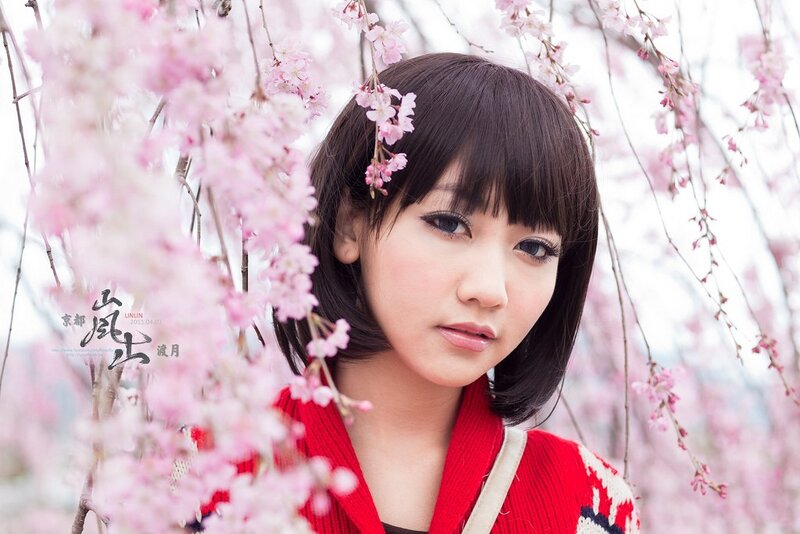 woman in cherry blossoms