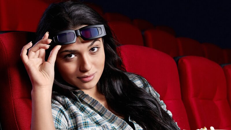 woman in cinema with 3d glasses