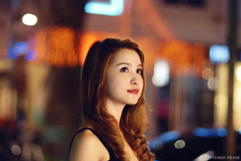 woman in city at night