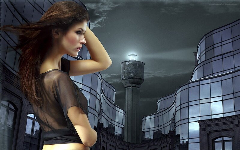 woman in city at night