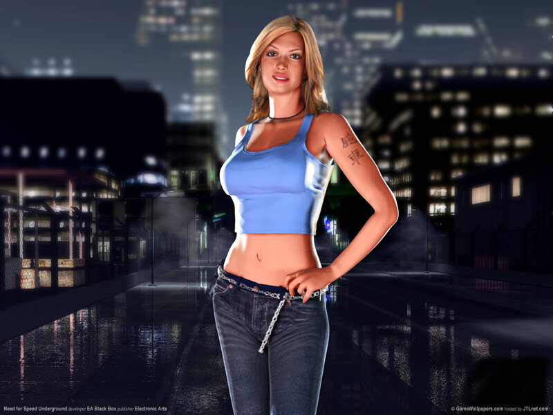 Woman in city at night