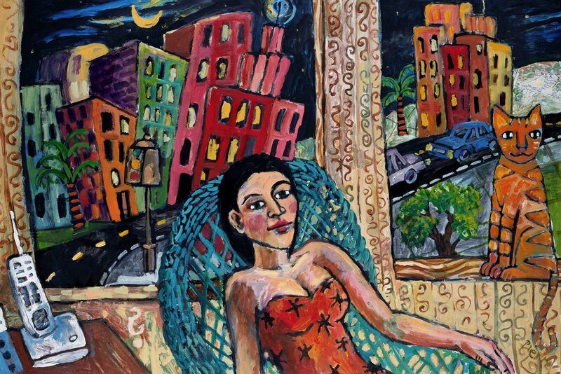 Woman in city at night