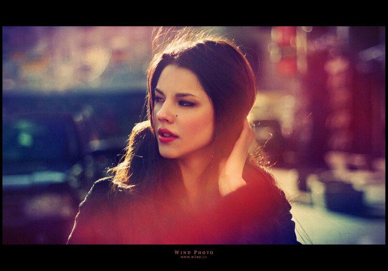 woman in city at sunset