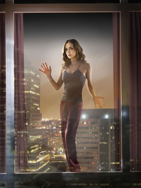 woman in city window