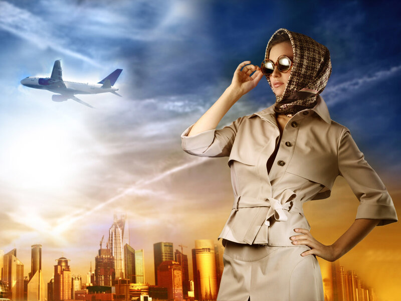 woman in city with airplane