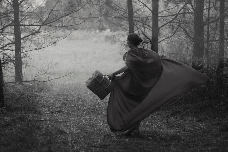 Woman in Cloak Walking