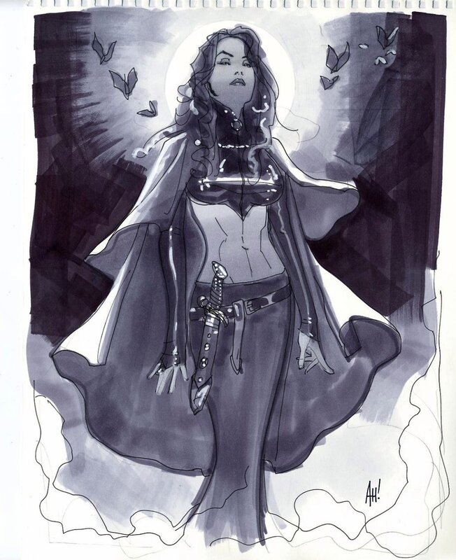 woman in cloak with sword
