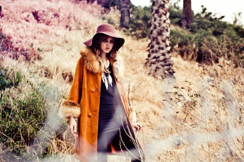 woman in coat and hat outdoors