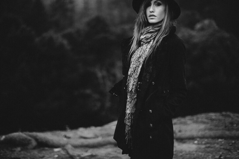 woman in coat and hat