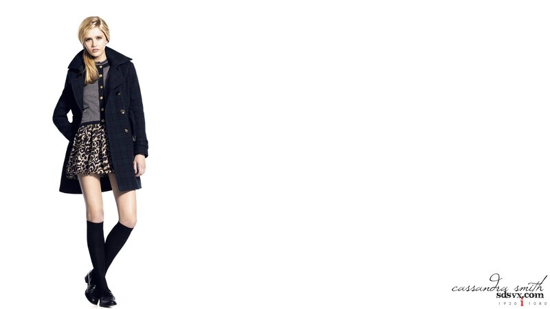 woman in coat and skirt