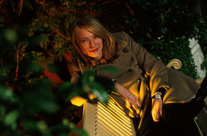 woman in coat at night