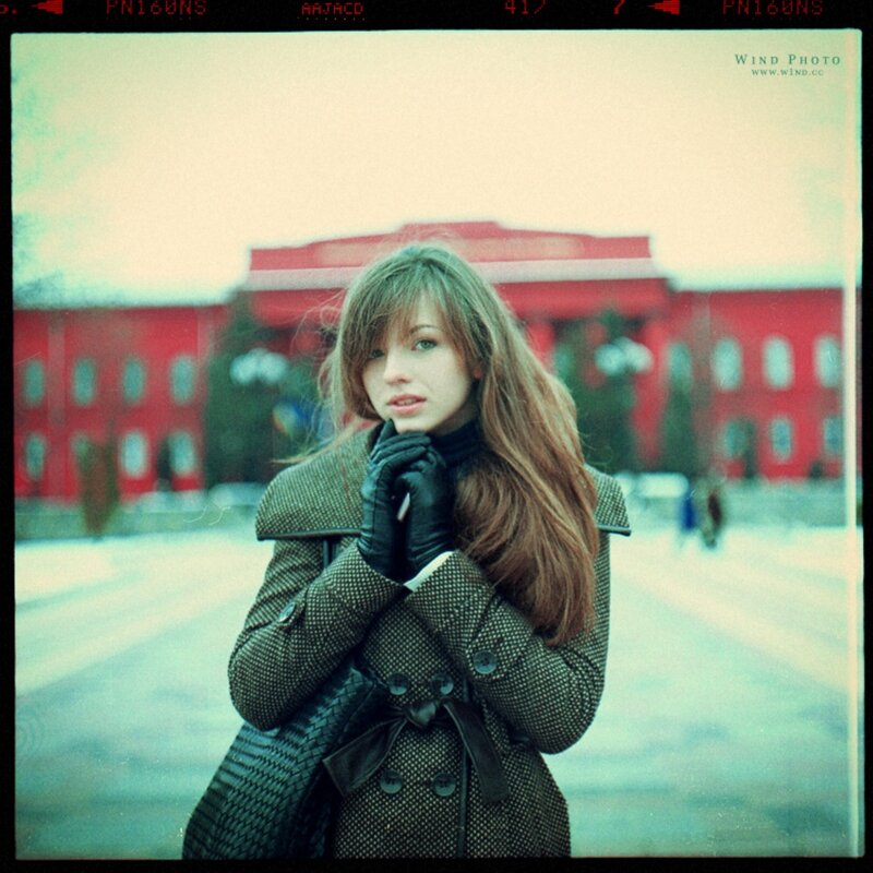woman in coat on street