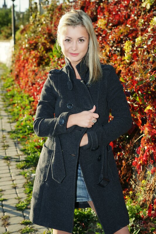 Woman in coat outdoors
