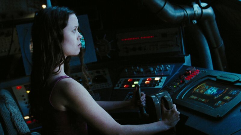 Woman in Cockpit — Blue, Dramatic, Night