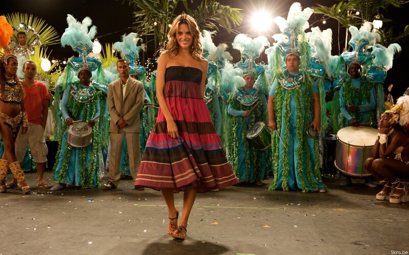 Woman in colorful dress at carnival