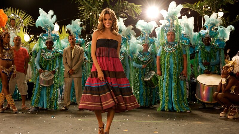 Woman in colorful dress at carnival