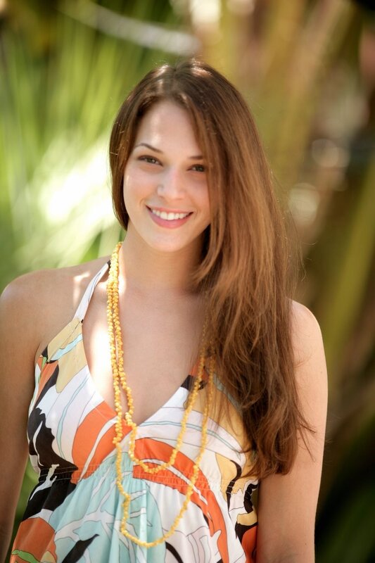 woman in colorful dress smiling
