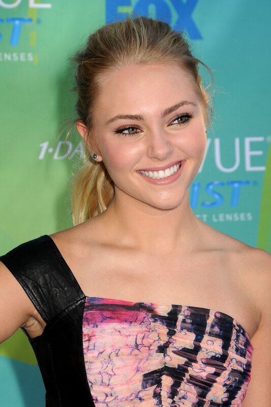 woman in colorful dress smiling
