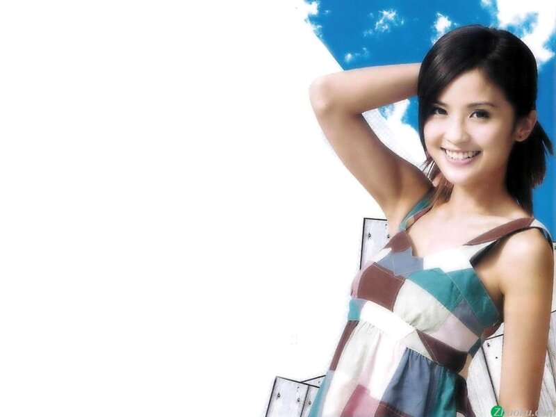 woman in colorful dress smiling