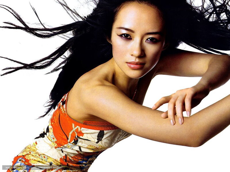 woman in colorful dress with flowing hair