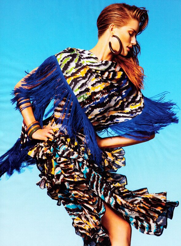 woman in colorful fringed dress