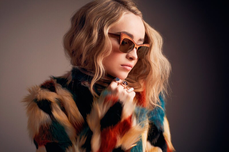 woman in colorful fur coat