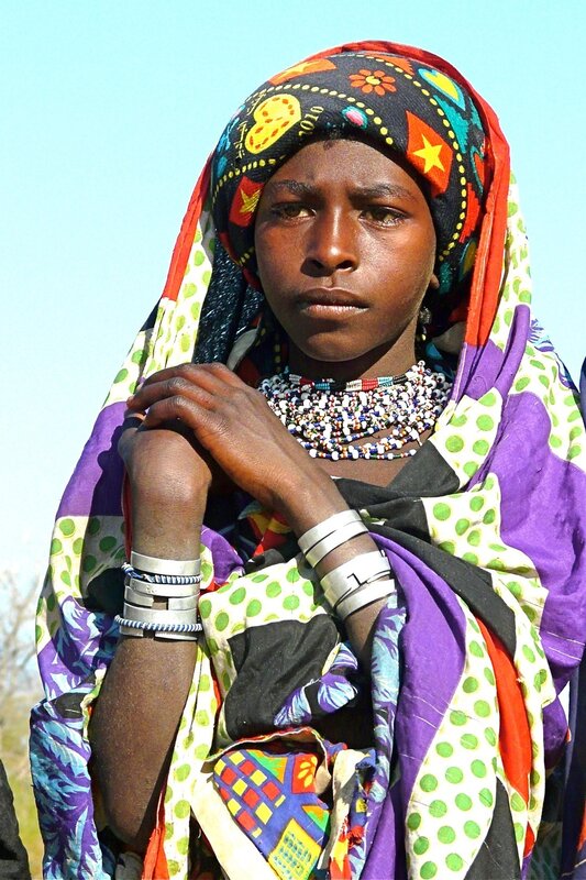 woman in colorful headscarf