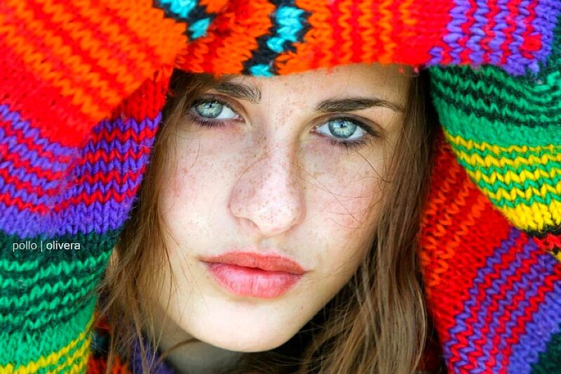 woman in colorful knit hat