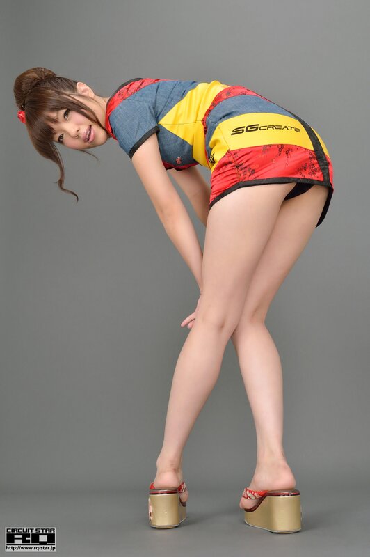woman in colorful outfit posing