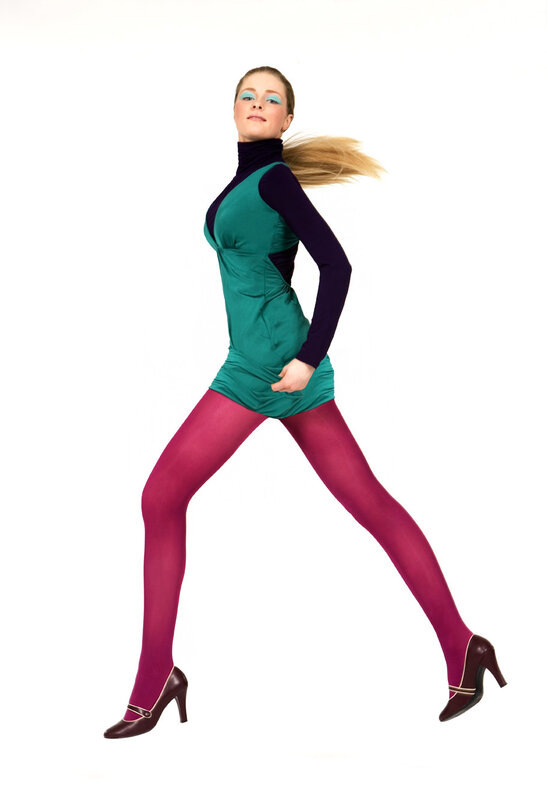 woman in colorful outfit posing