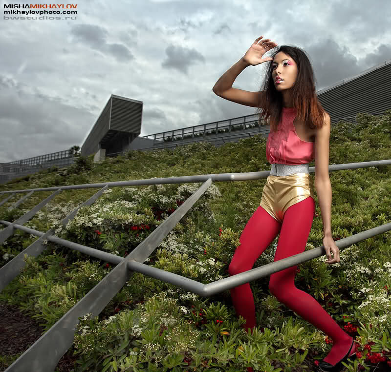 Woman in Colorful Outfit — Red, Dramatic