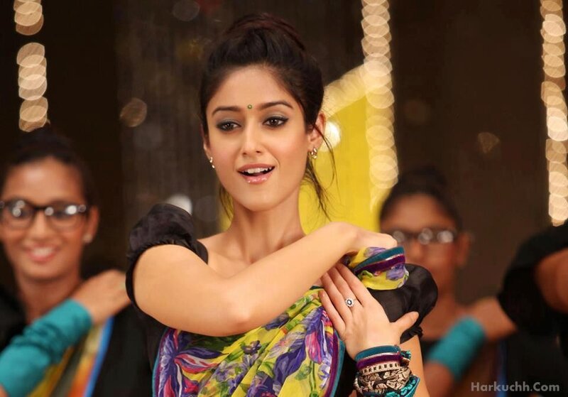woman in colorful sari dancing