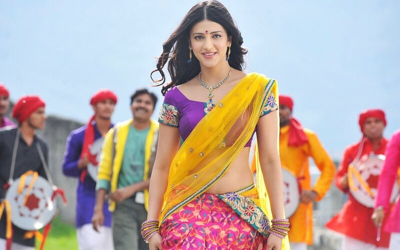woman in colorful sari smiling