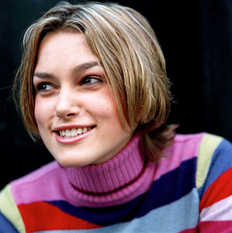 woman in colorful sweater
