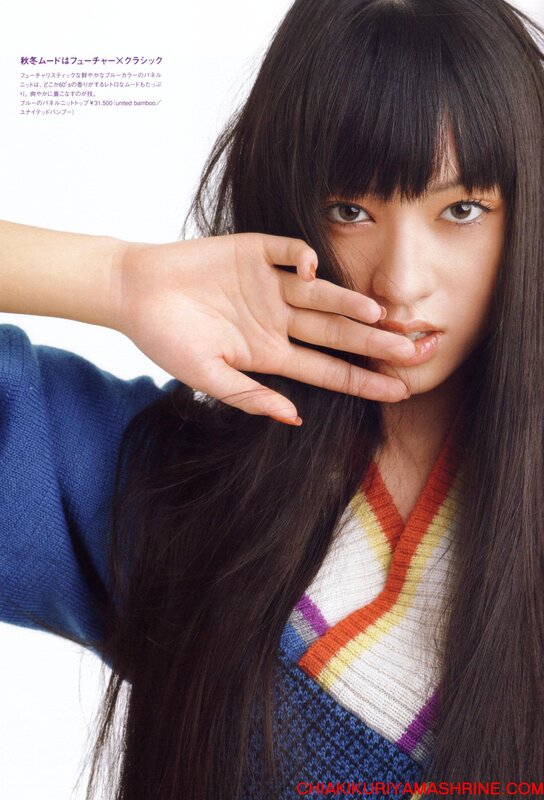 woman in colorful sweater