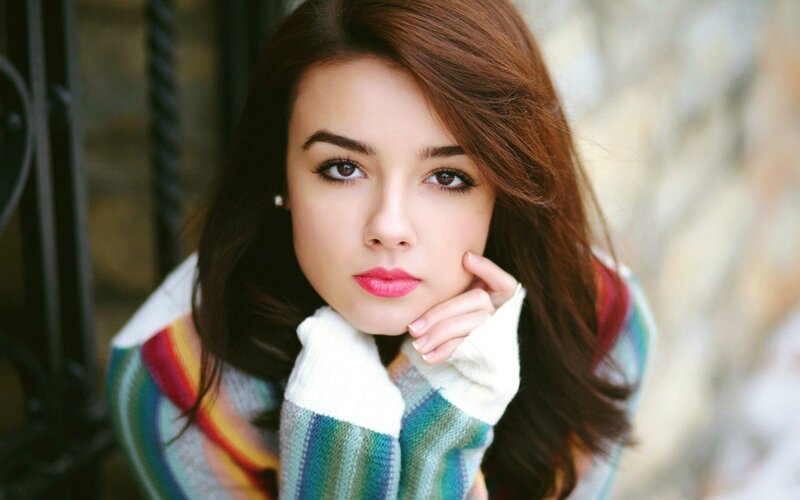 woman in colorful sweater