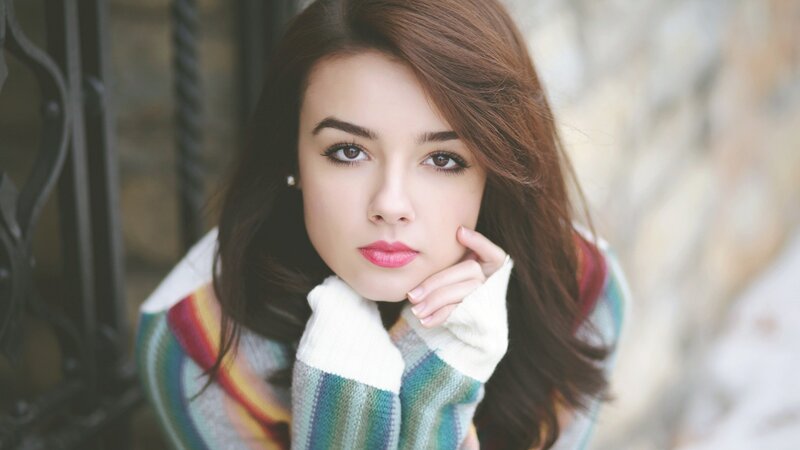 woman in colorful sweater