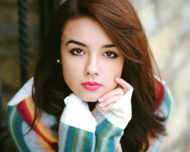 woman in colorful sweater