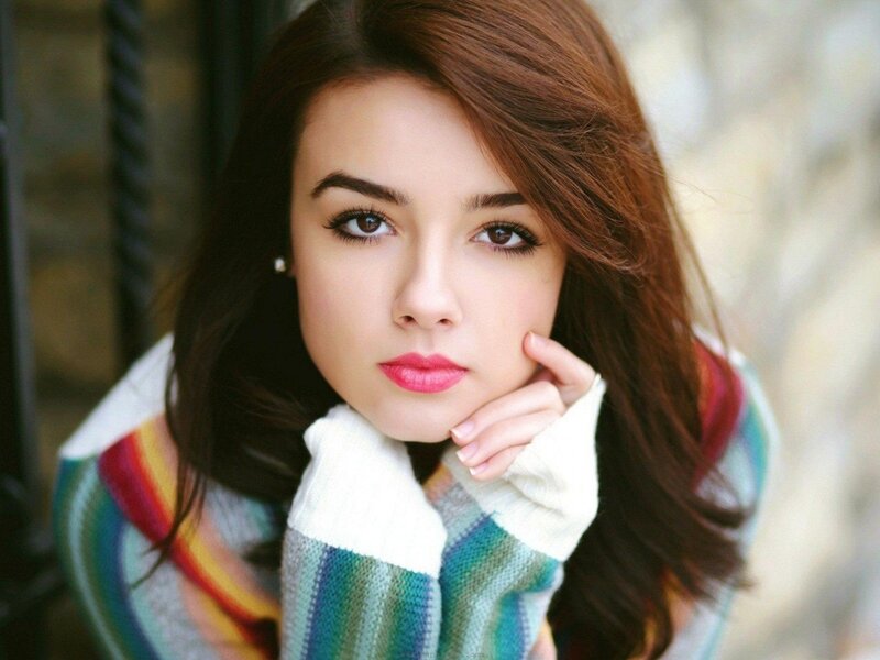 woman in colorful sweater