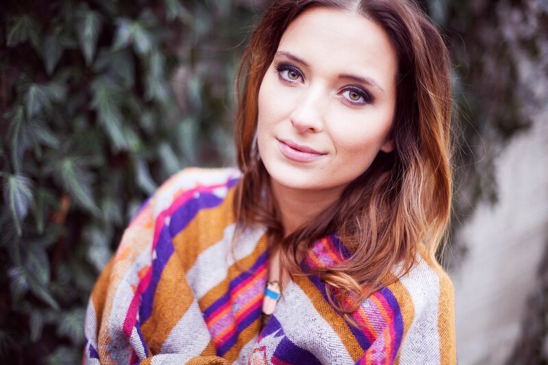 woman in colorful sweater