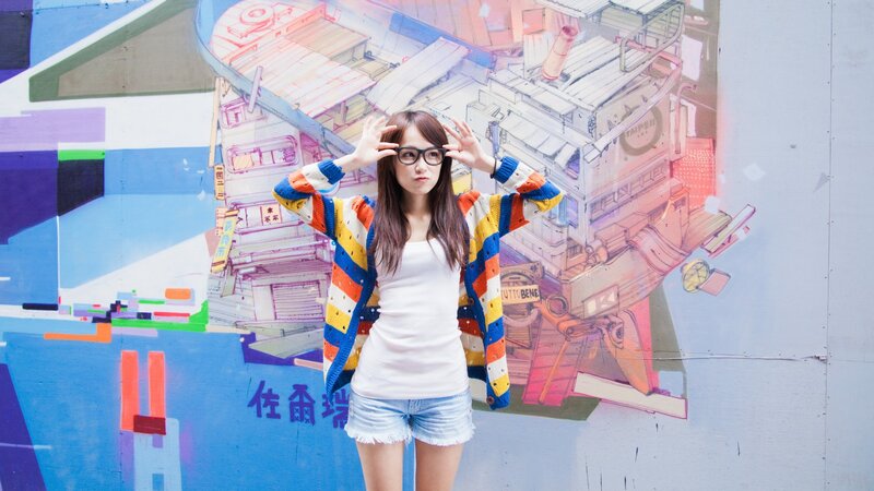 woman in colorful sweater