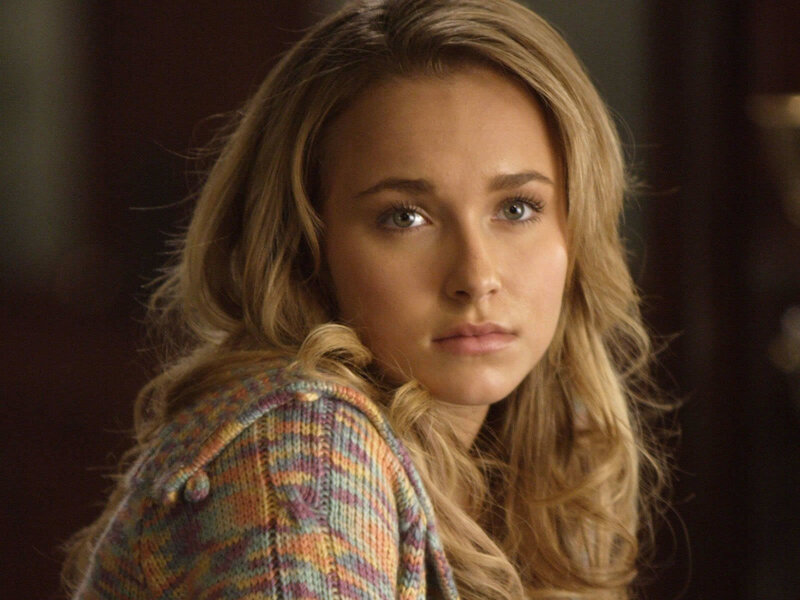 woman in colorful sweater