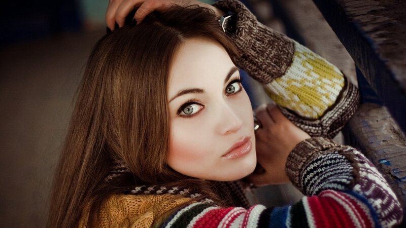 woman in colorful sweater