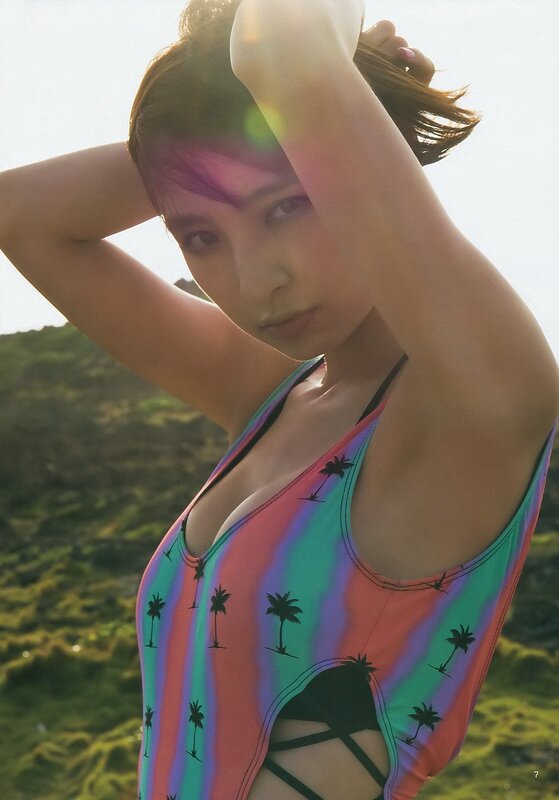 woman in colorful swimsuit at beach